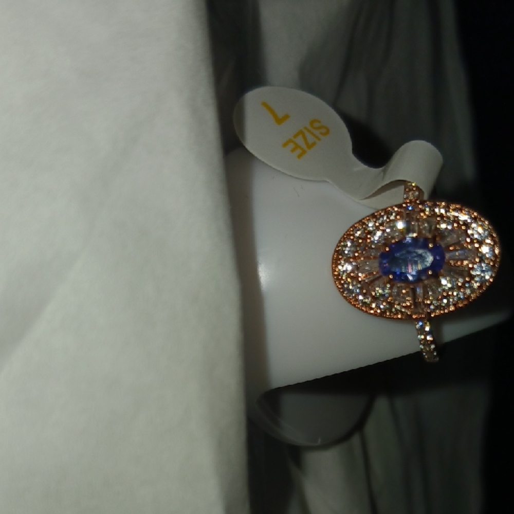 She Brings The Heart With Elegance  and Grace, This Tanzanite, Rose Gold  Ring.